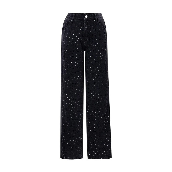 Jean taille haute orné de strass et boutonné sur le côté