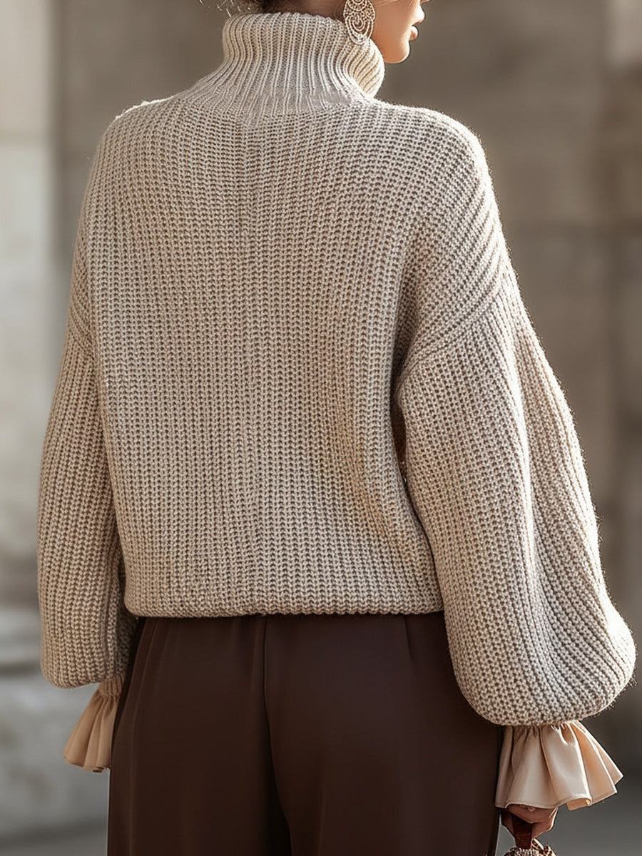 Pull à col roulé en maille crème avec poignets à volants