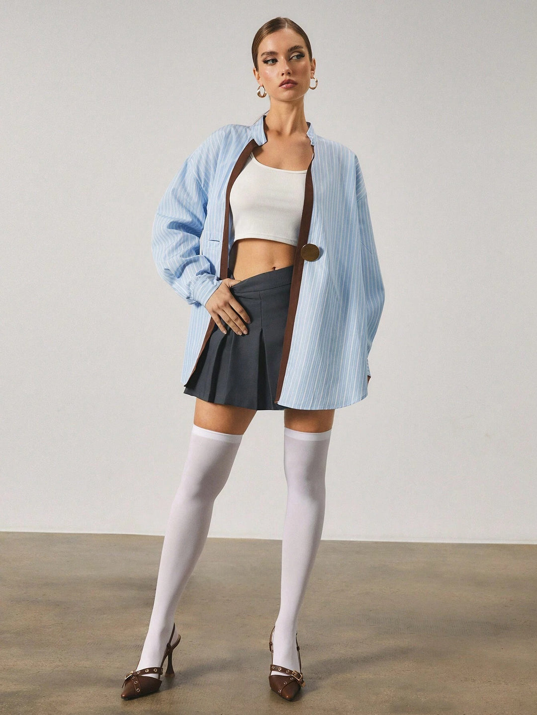 Chemise longue à rayures avec fermeture en métal