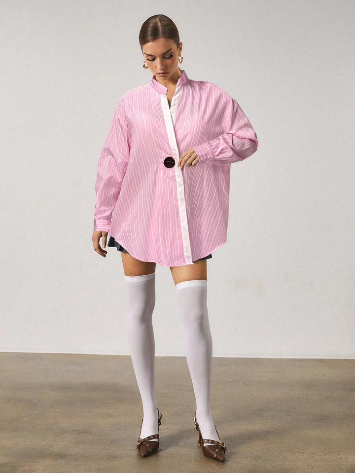 Chemise longue à rayures avec fermeture en métal