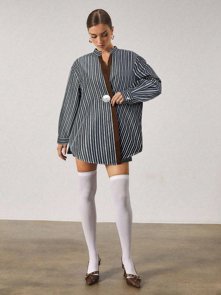 Chemise longue à rayures avec fermeture en métal