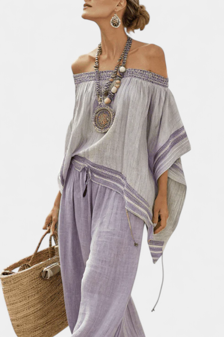 Haut à épaules dénudées et pantalon à jambes larges à rayures