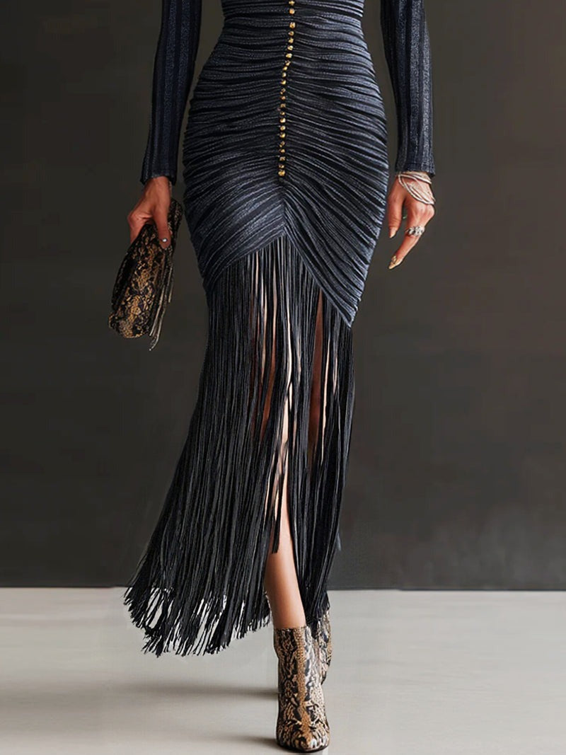 Robe moulante plissée et à franges