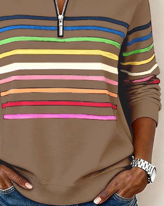 Pull à demi-zip et rayures