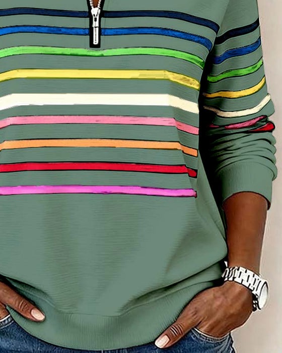 Pull à demi-zip et rayures