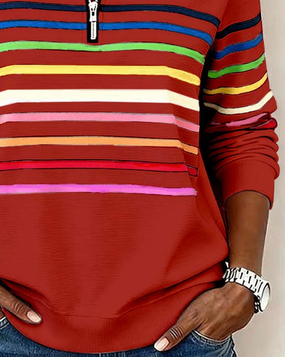 Pull à demi-zip et rayures