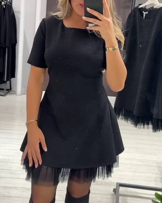 Robe élégante en maille scintillante