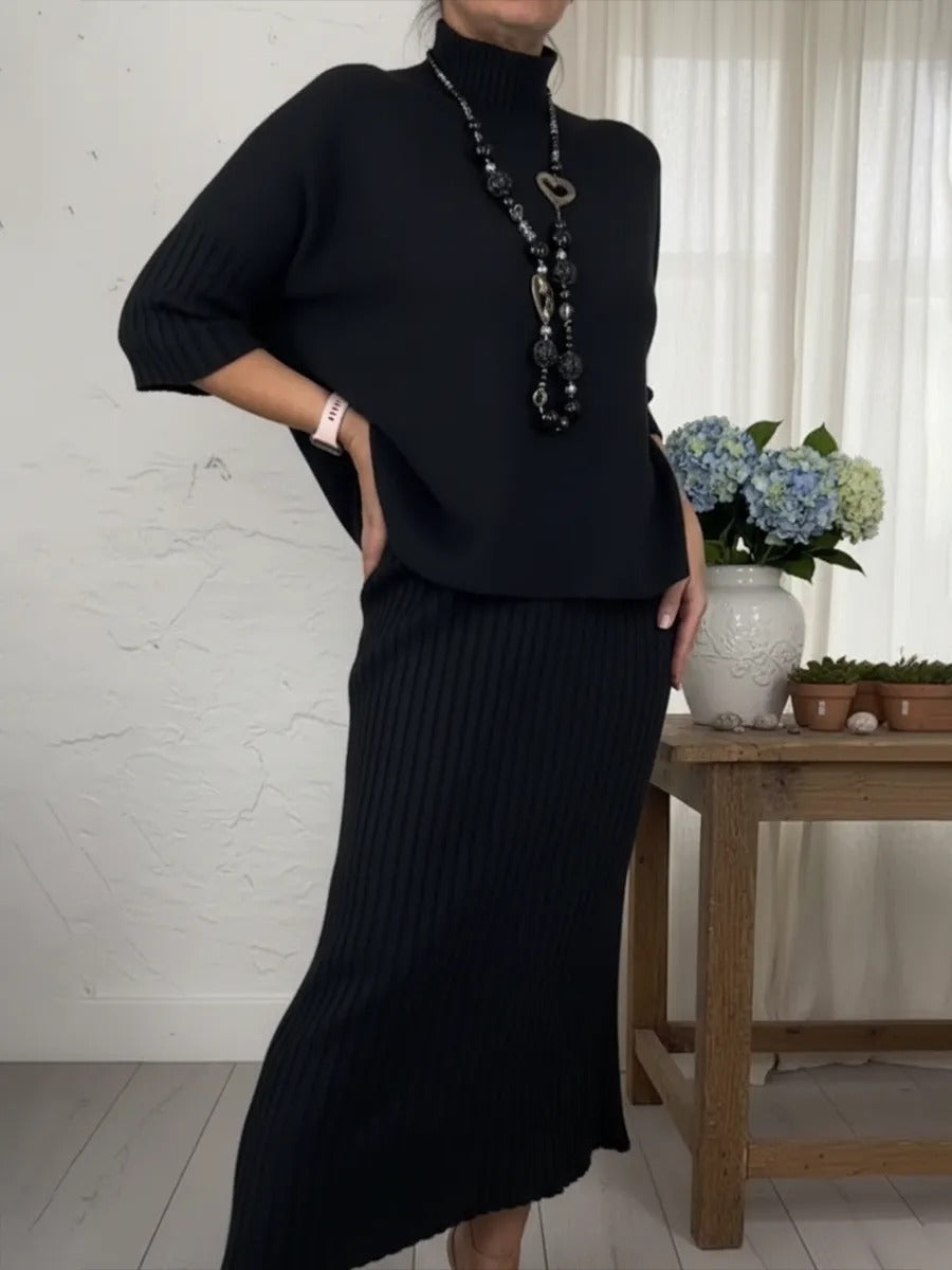 Ensemble élégant composé d'un pull à col roulé et d'une jupe