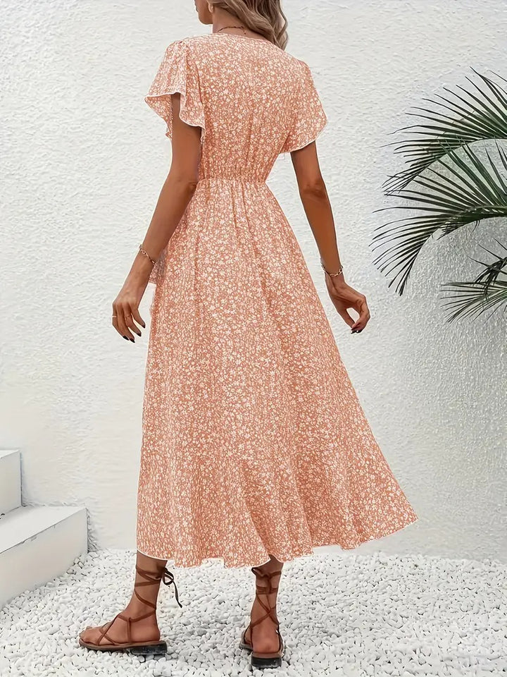 Robe mi-longue élégante à motifs floraux