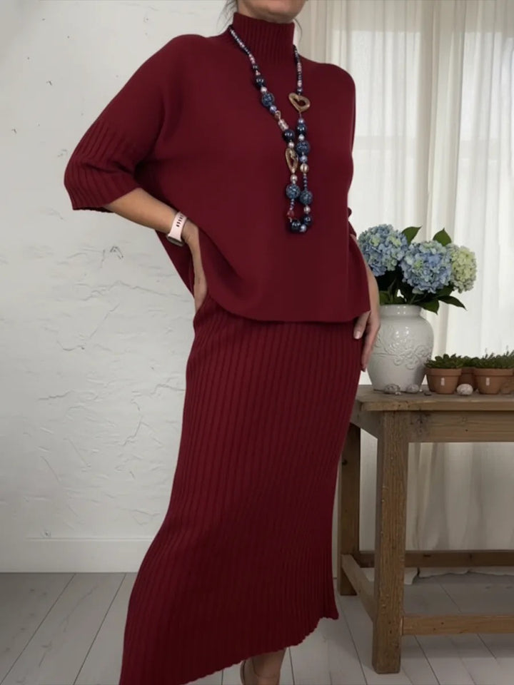 Ensemble élégant composé d'un pull à col roulé et d'une jupe