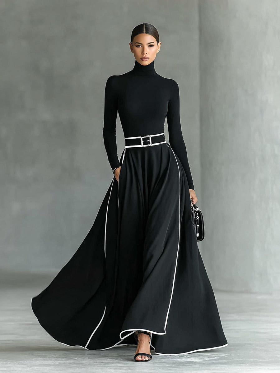 Robe longue noire col montant manches longues ceinturée avec surpiqûres