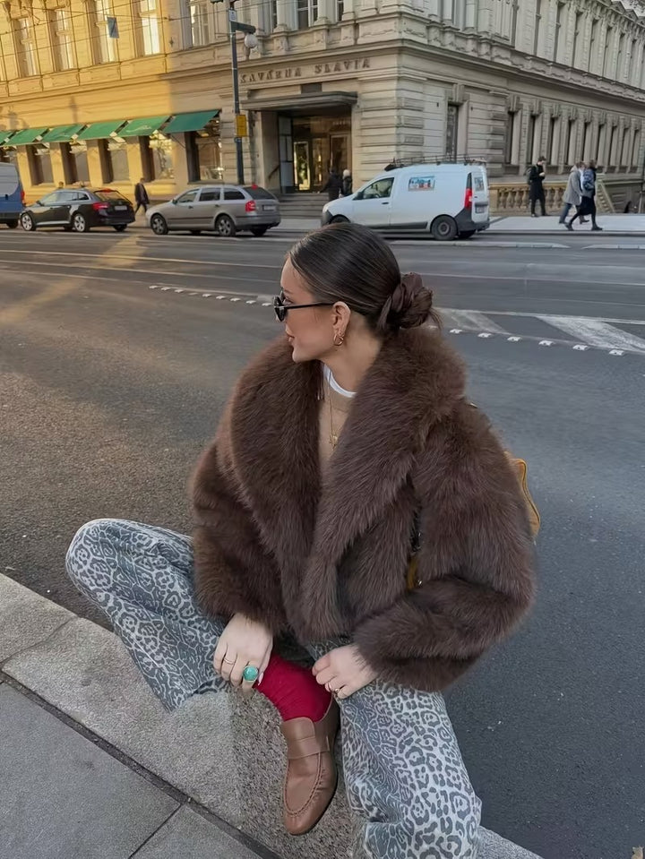 Manteau élégant en fausse fourrure