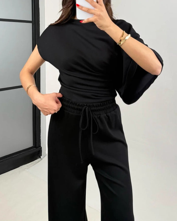 Ensemble deux pièces haut et pantalon irréguliers à la mode