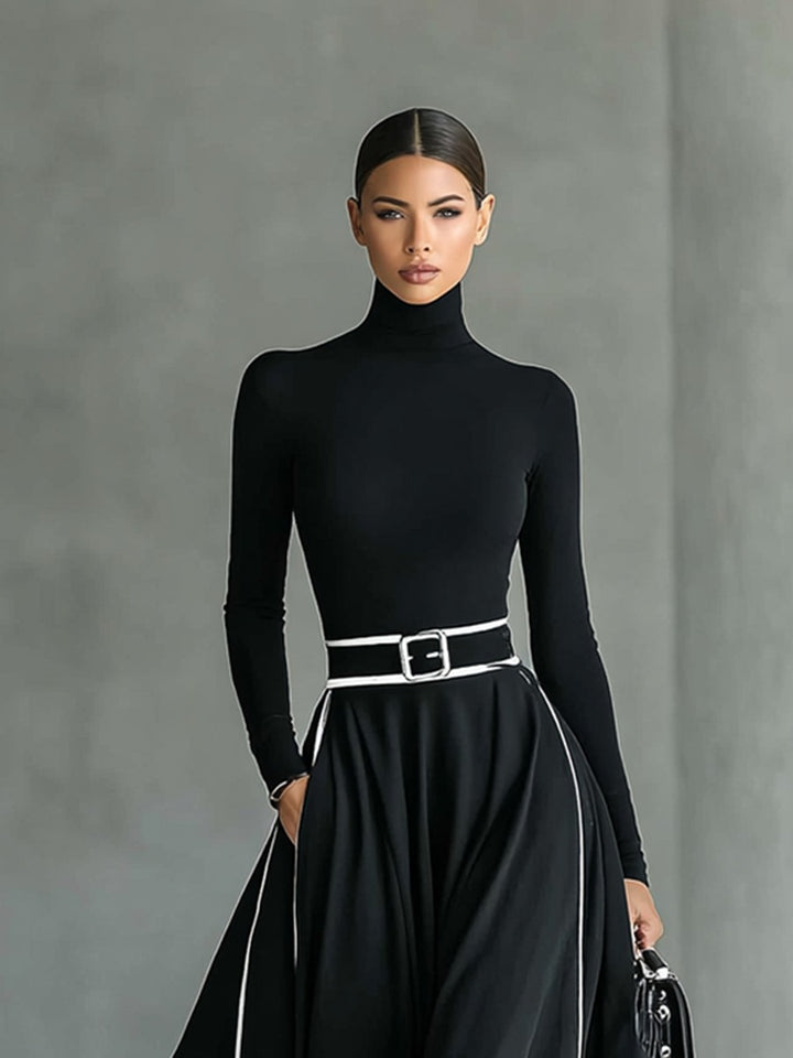 Robe longue noire col montant manches longues ceinturée avec surpiqûres