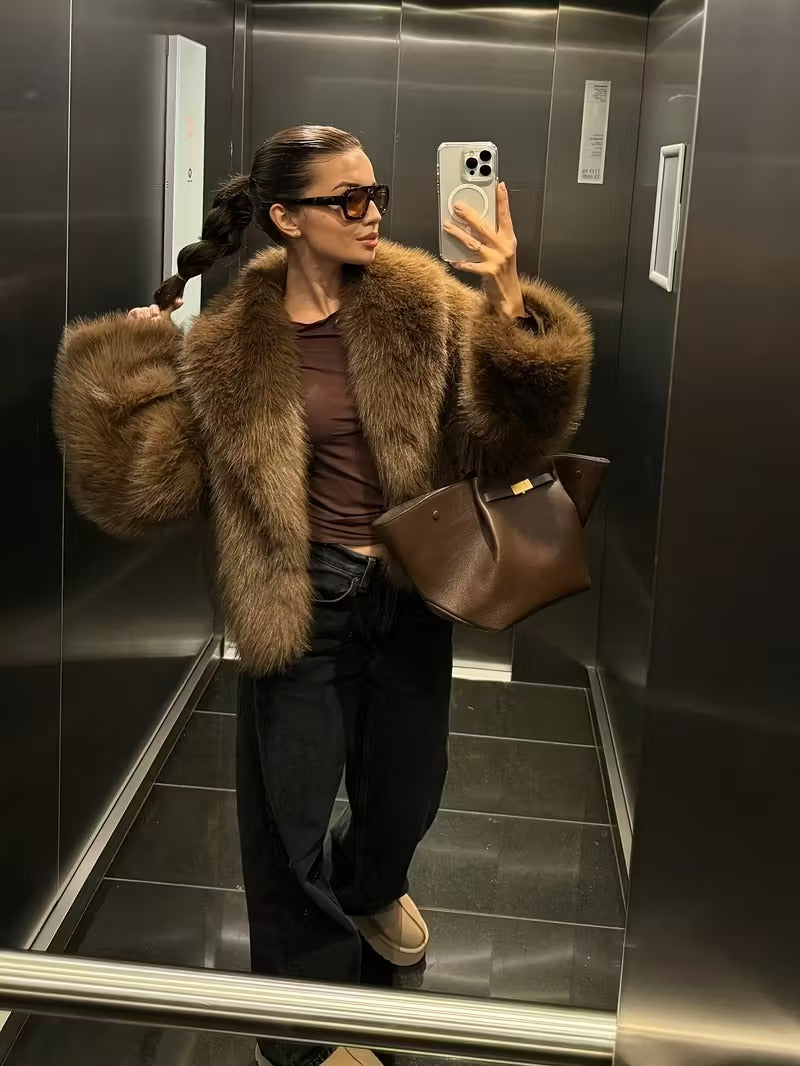 Manteau élégant en fausse fourrure