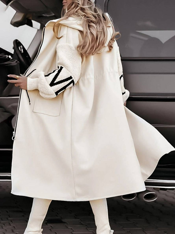 Manteau long à capuche ample