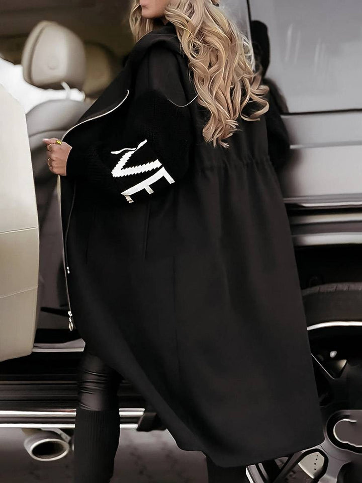 Manteau long à capuche ample