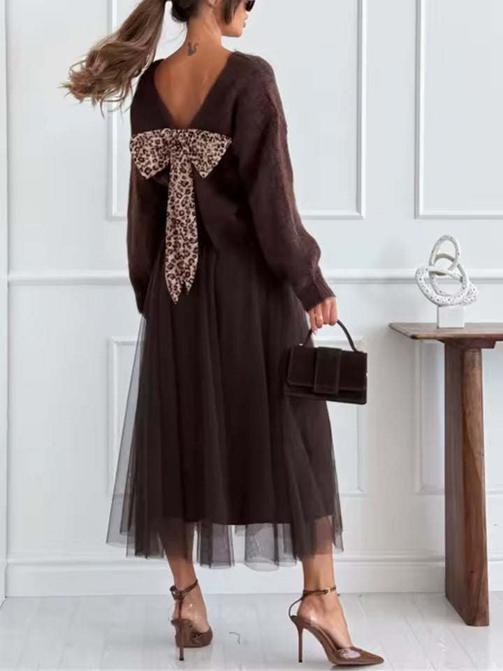 Pull à nœud et jupe fluide