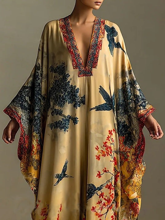Robe à manches chauve-souris imprimée de fleurs et d'oiseaux