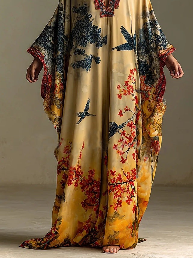 Robe à manches chauve-souris imprimée de fleurs et d'oiseaux