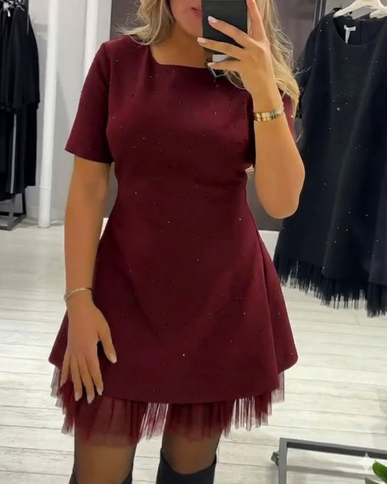Robe élégante en maille scintillante