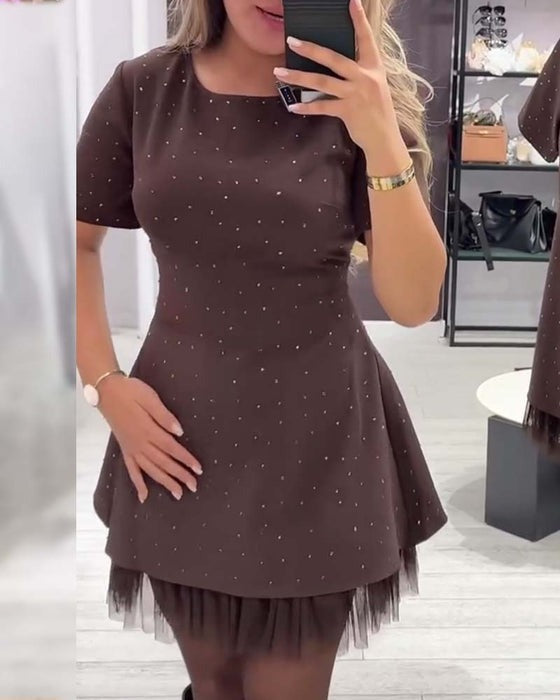 Robe élégante en maille scintillante