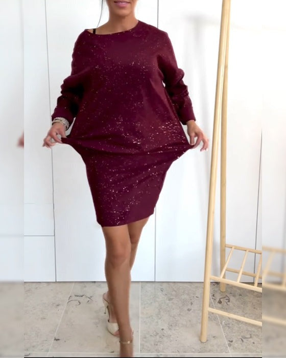 Robe pull à col rond ornée de fines paillettes