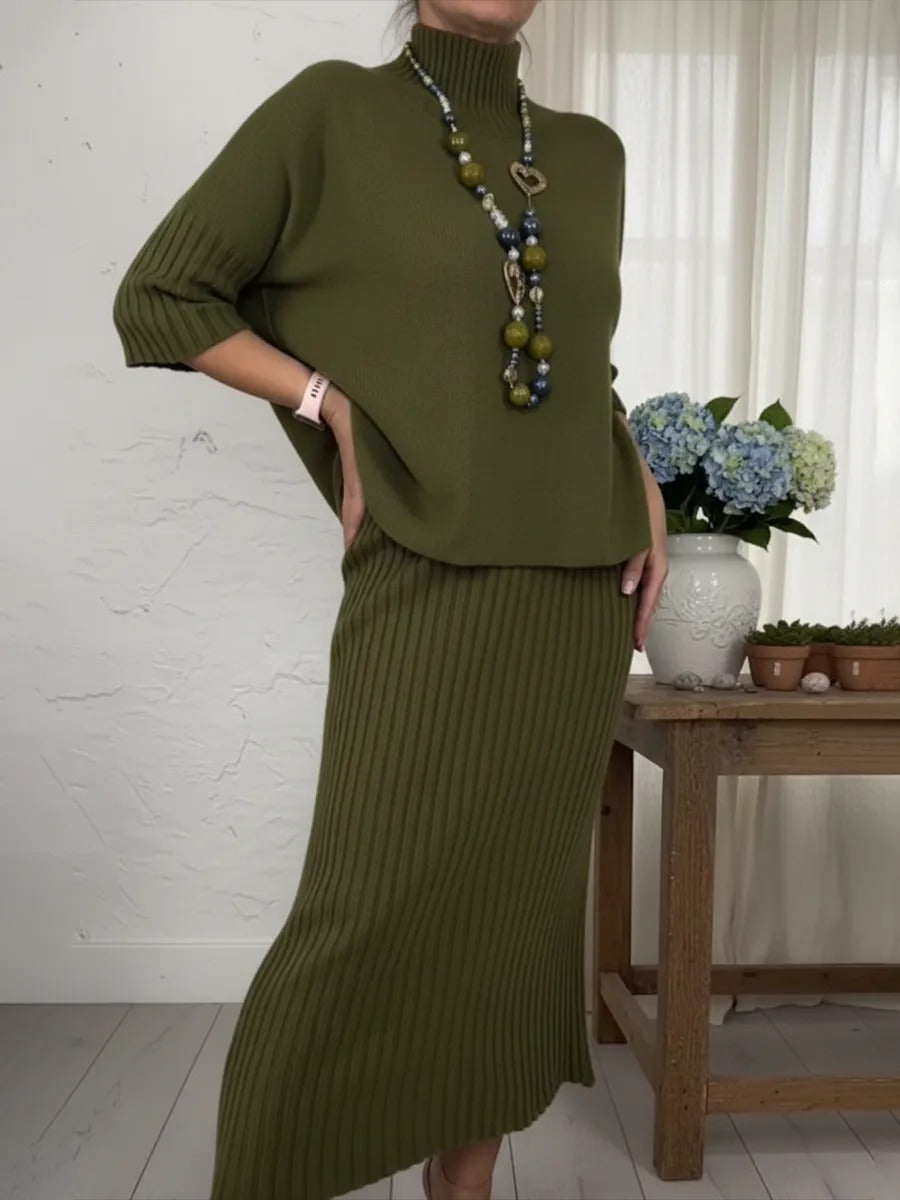 Ensemble élégant composé d'un pull à col roulé et d'une jupe