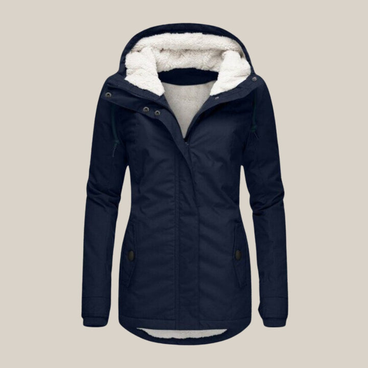 Harper | Chaqueta acolchada con forro de sherpa y capucha para mujer