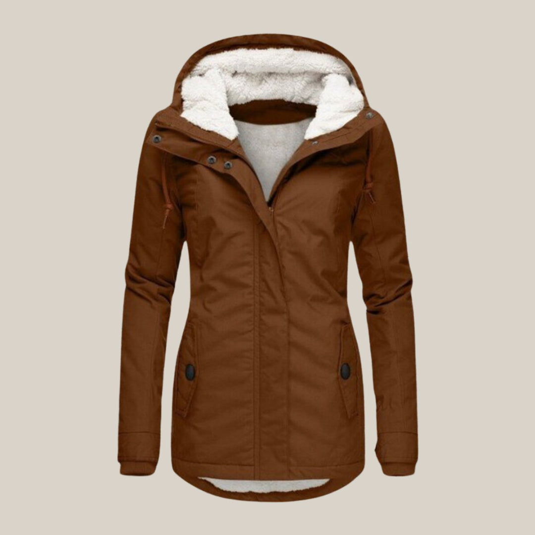 Harper | Chaqueta acolchada con forro de sherpa y capucha para mujer