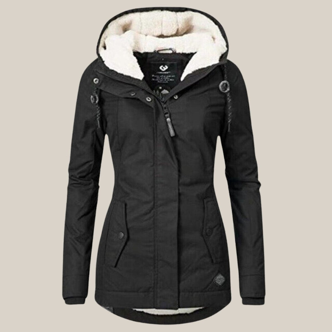 Harper | Chaqueta acolchada con forro de sherpa y capucha para mujer