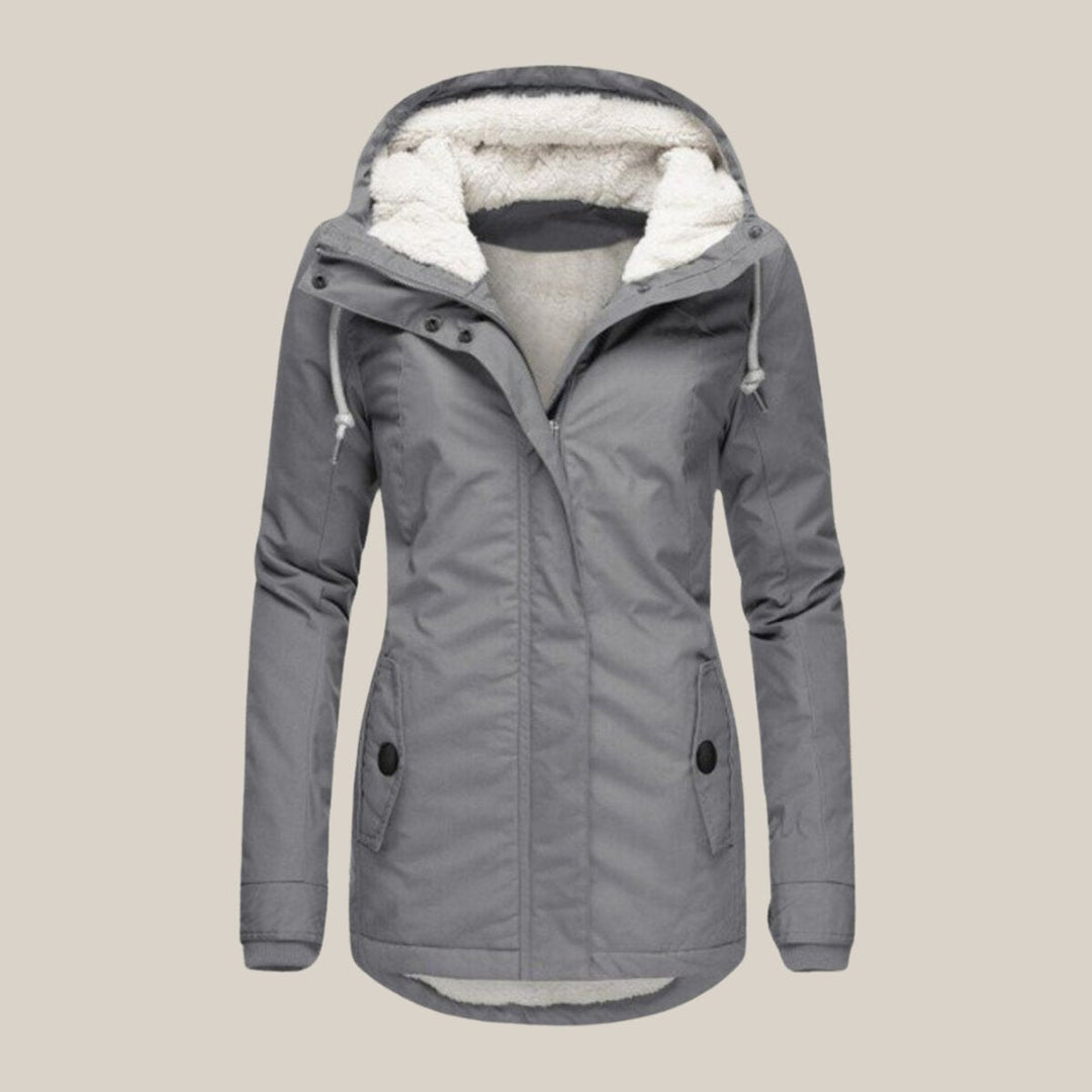Harper | Chaqueta acolchada con forro de sherpa y capucha para mujer