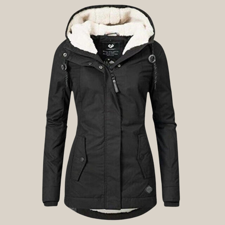 Harper | Chaqueta acolchada con forro de sherpa y capucha para mujer