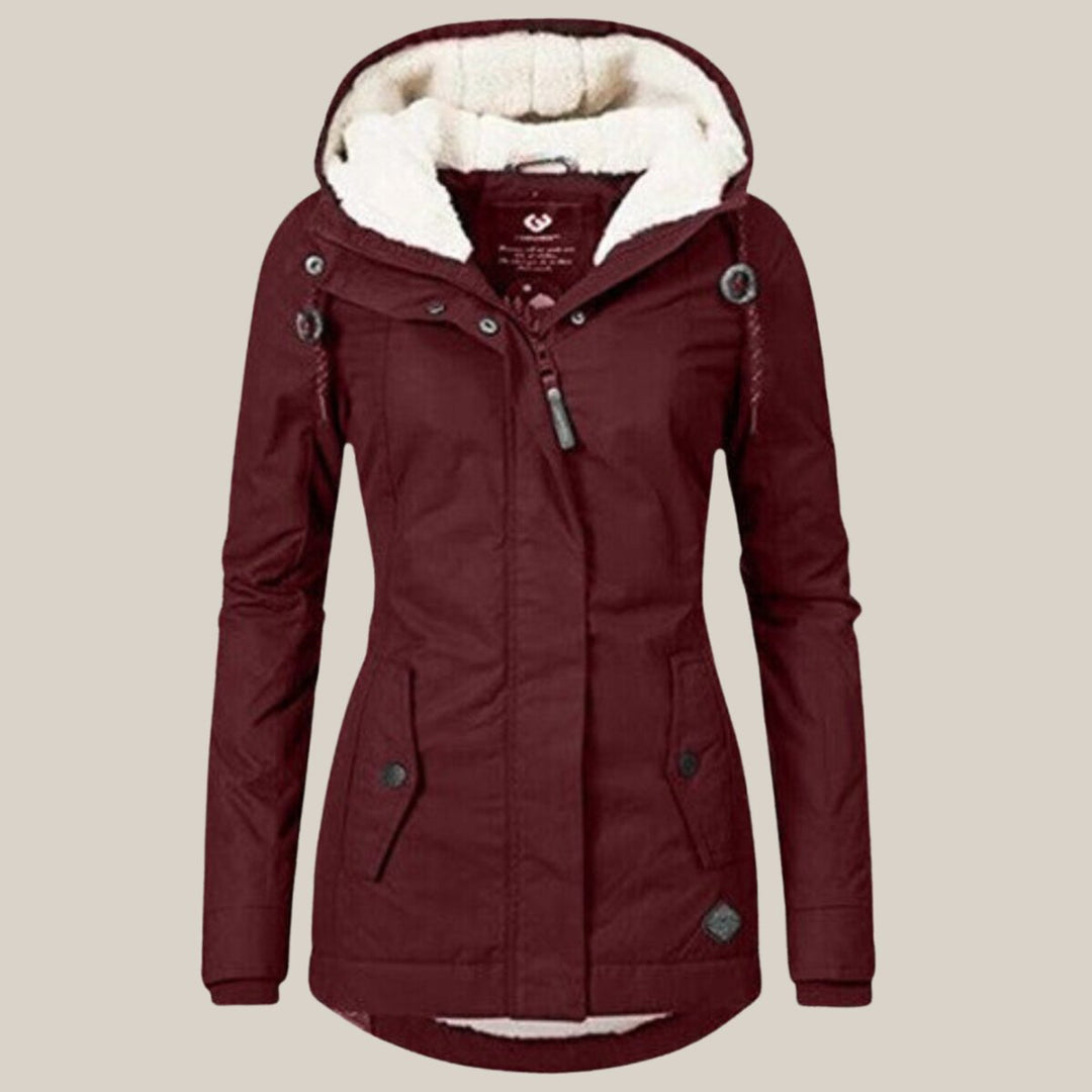 Harper | Chaqueta acolchada con forro de sherpa y capucha para mujer