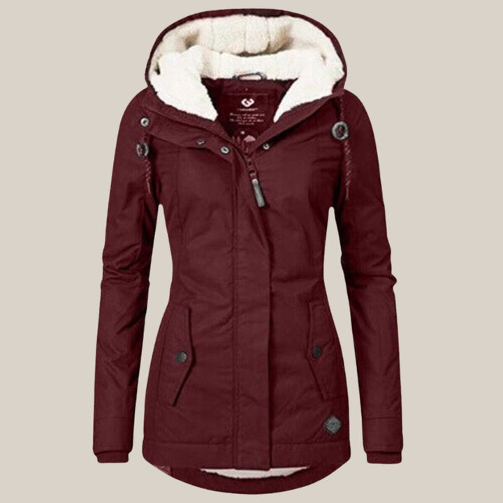 Harper | Chaqueta acolchada con forro de sherpa y capucha para mujer